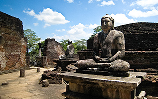 Buddha statue in ancient Polonnaruwa city on a sunny day